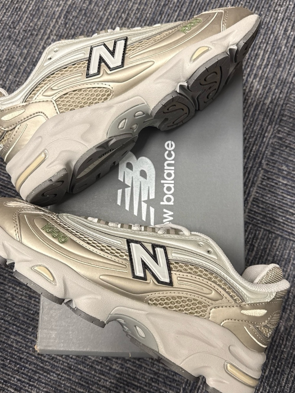 New Balance 1000 Arid Stone Men's Athletic Sneakers in Metallic Silver and Cream